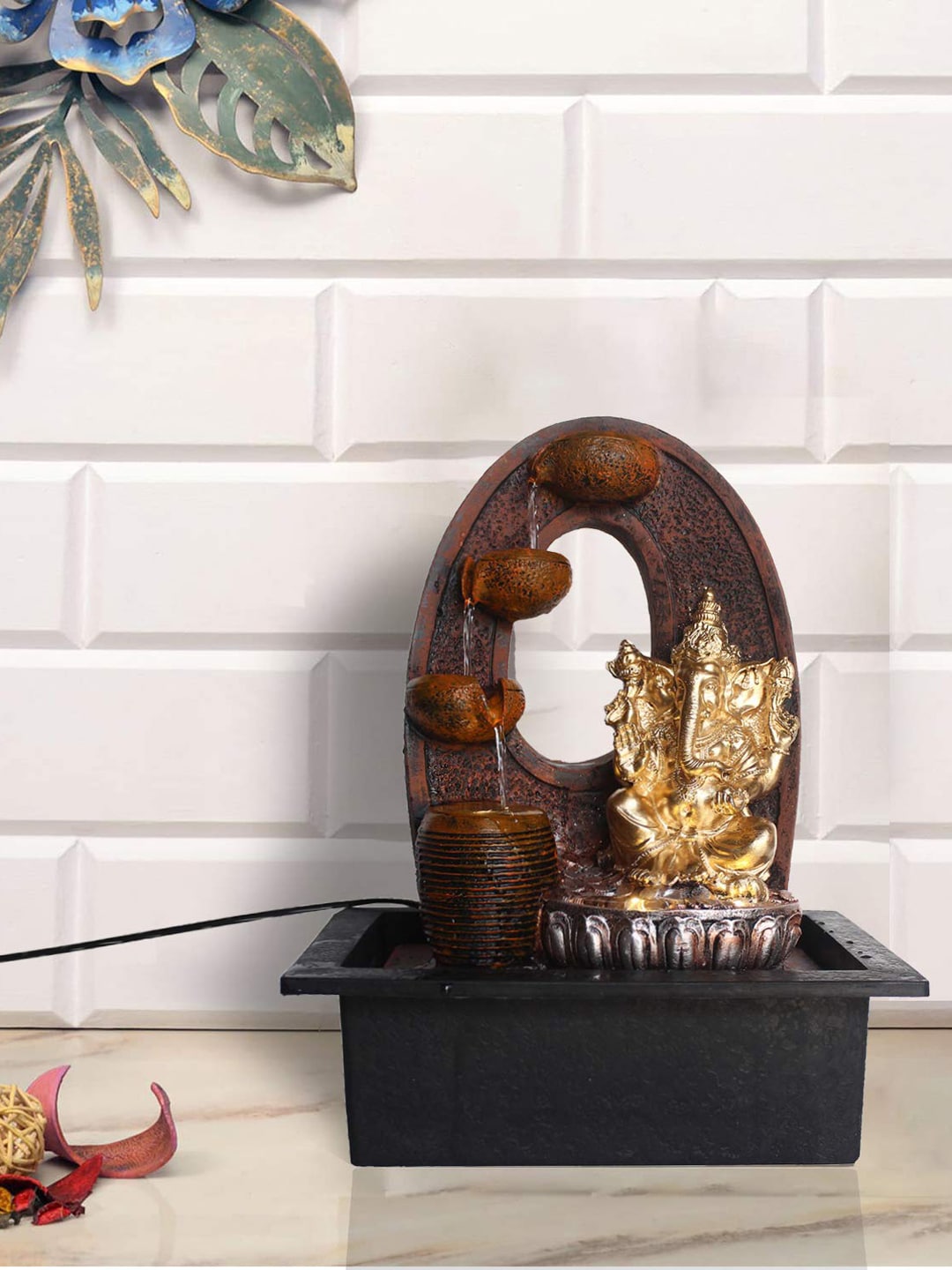 eCraftIndia Gold-Toned & Brown Polyresin Ganesha 4 Step Water Fountain With Led Lights Price in India