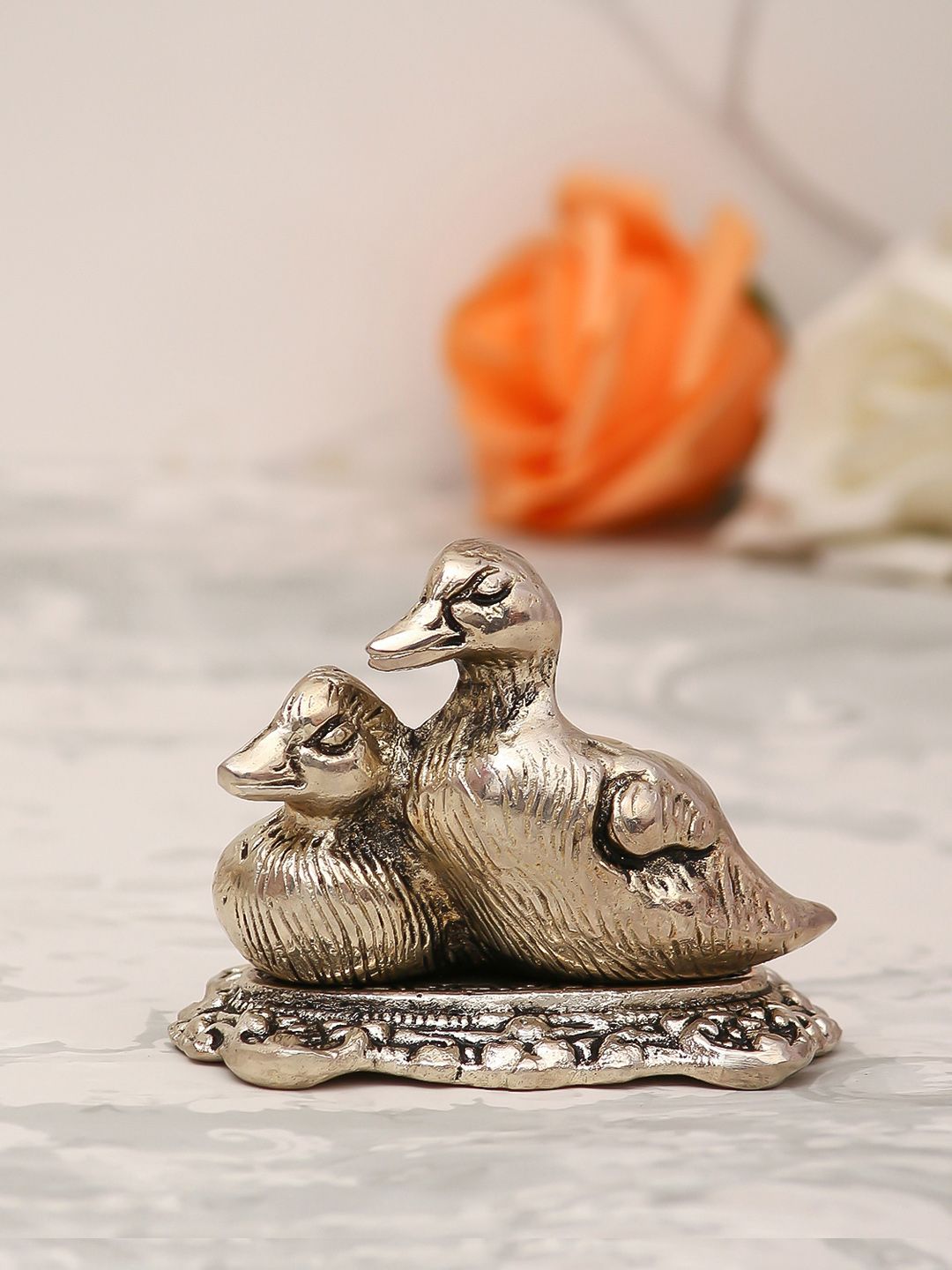 eCraftIndia Gold-Toned Textured Loving Swans Showpiece Price in India