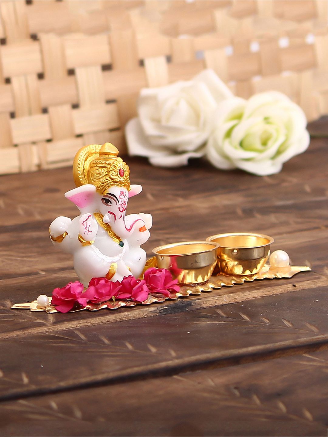 eCraftIndia White & Gold-Toned Lord Ganesha Idol On Decorative Leaf with 2 Holders Price in India