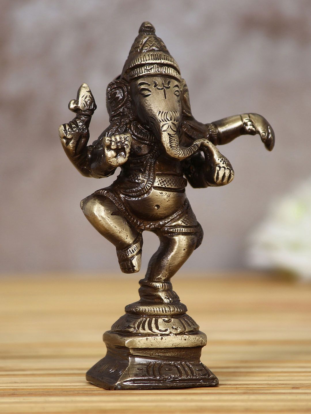 eCraftIndia Bronze-Toned Brass Handcrafted Dancing Lord Ganesha Idol Price in India