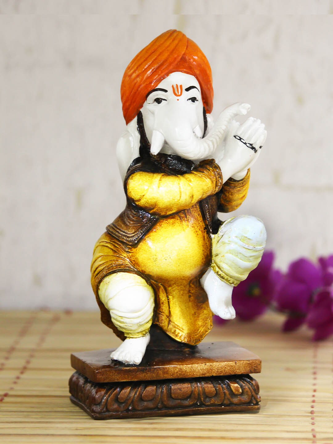 eCraftIndia White & Yellow Handcrafted Lord Ganesha Dancing Idol Price in India