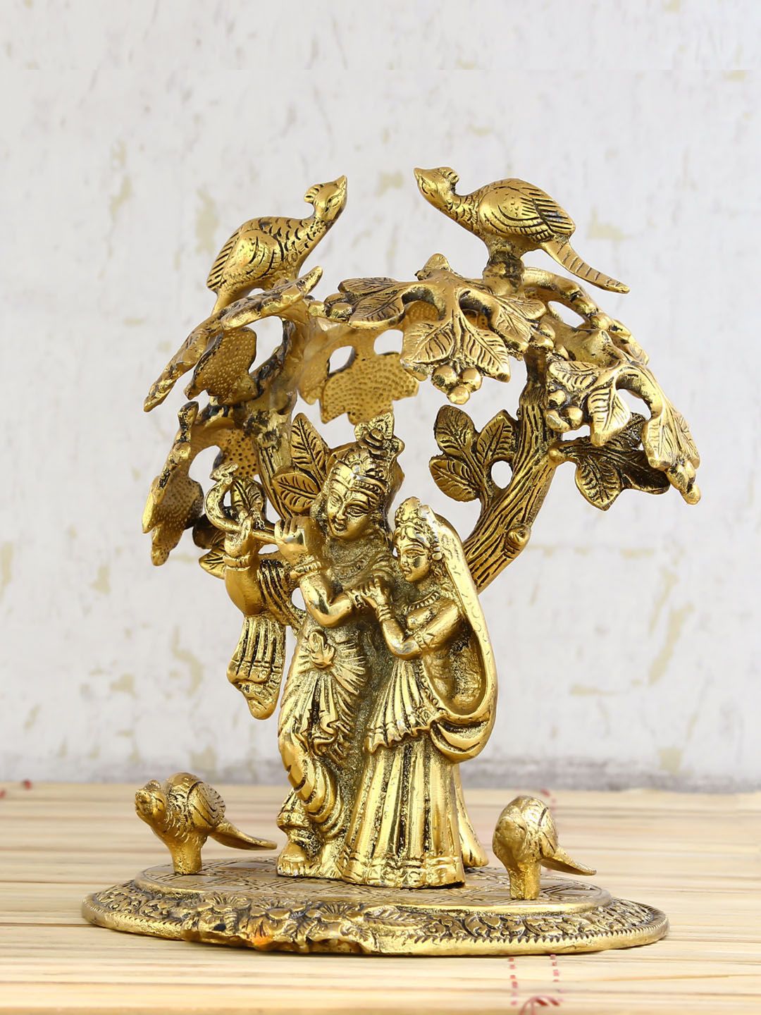 eCraftIndia Gold-Toned Handcrafted Radha Krishna Standing Under Tree Showpiece Price in India