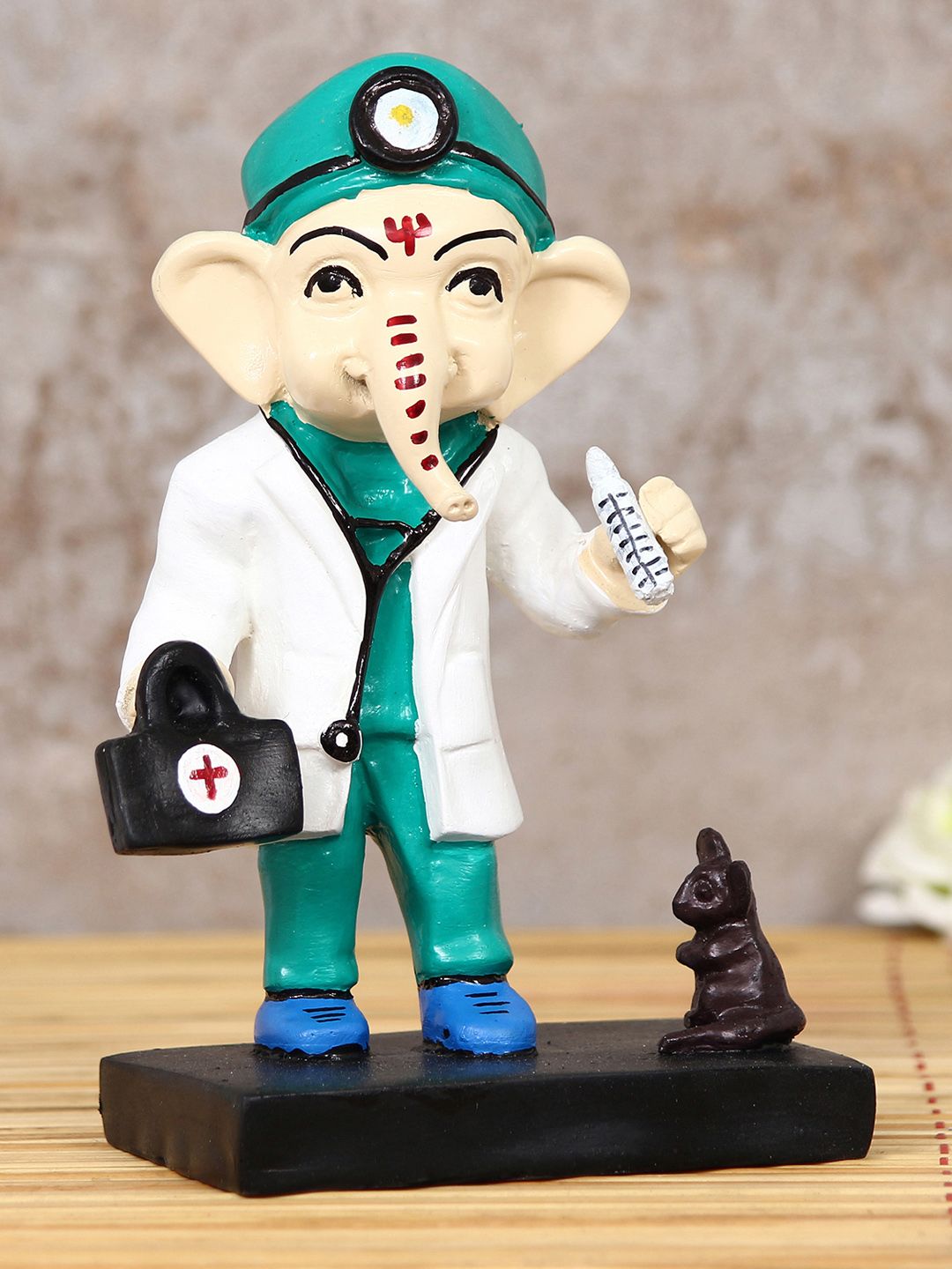 eCraftIndia White & Green Lord Ganesha Idol In Doctor Avatar Showpiece Price in India