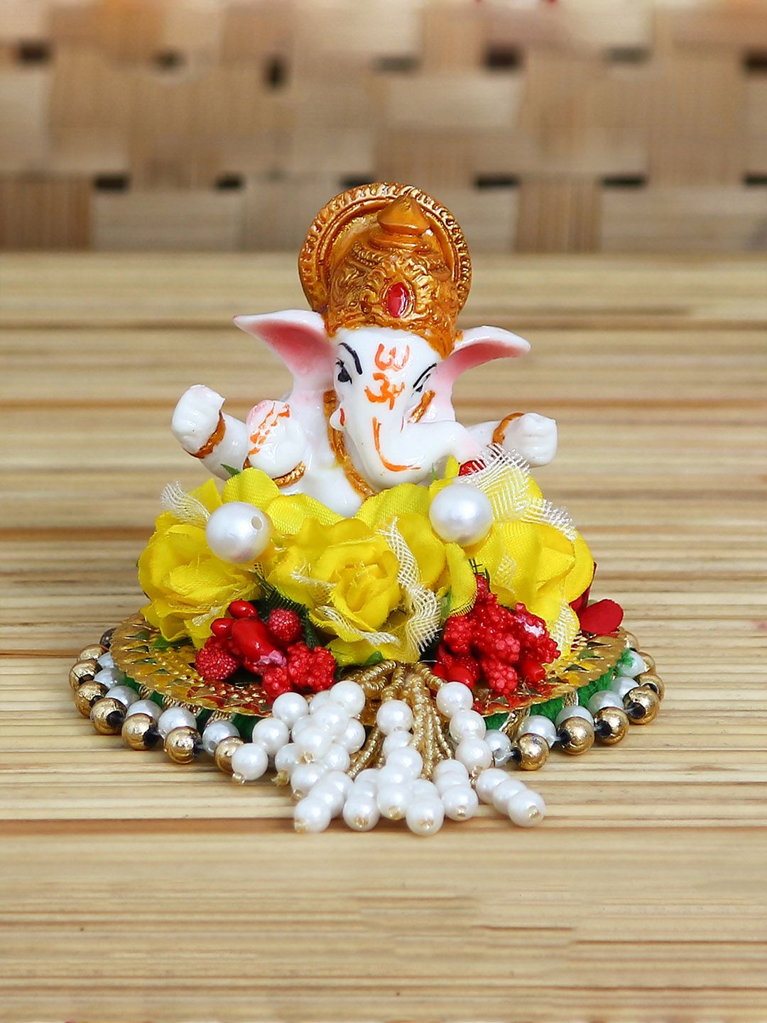 eCraftIndia White & Yellow Handcrafted Lord Ganesha On Decorative Plate With Flowers Price in India