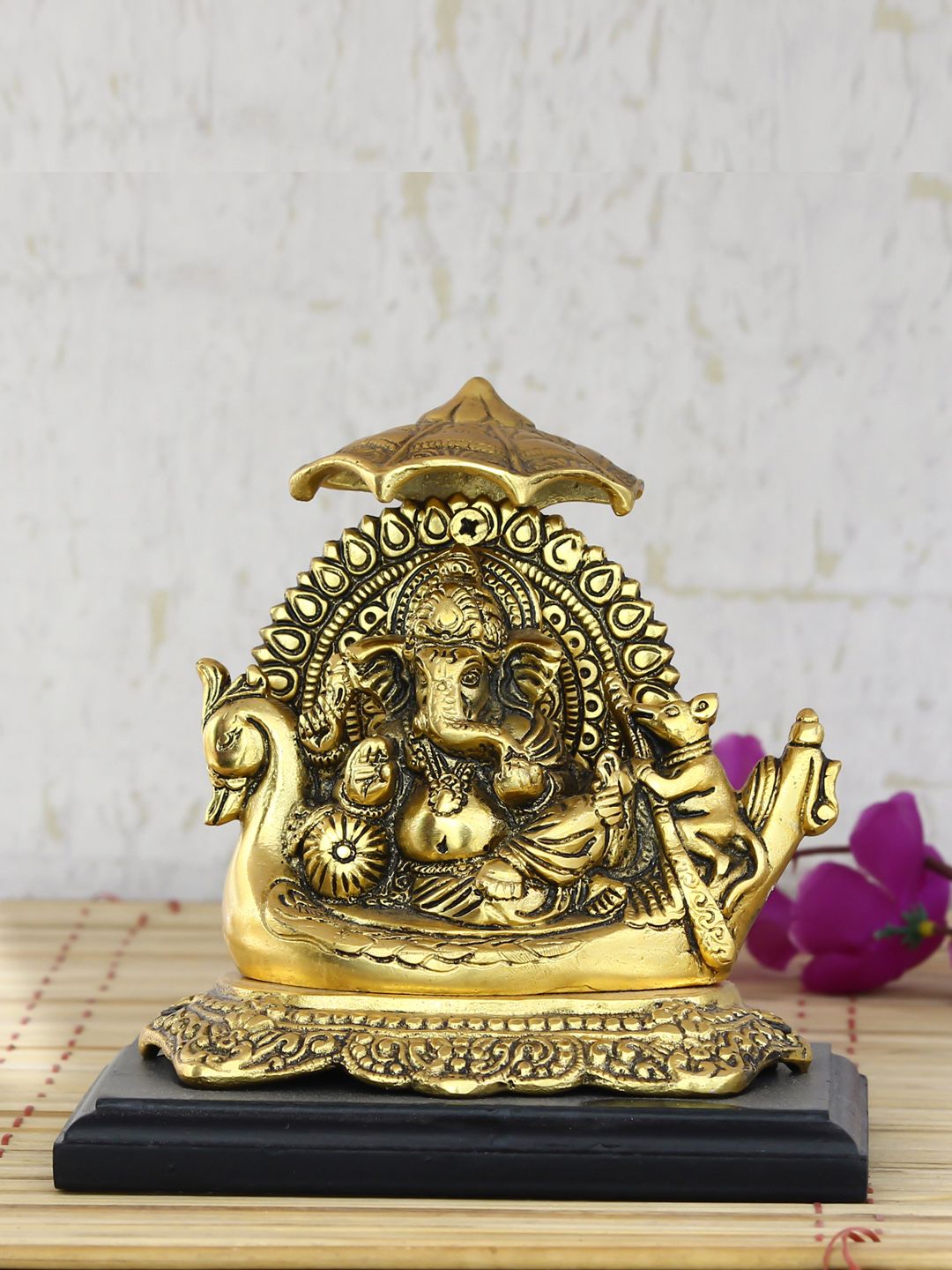 eCraftIndia Gold-Toned & Black Handcrafted Lord Ganesha Sitting On Swan Throne Showpiece Price in India