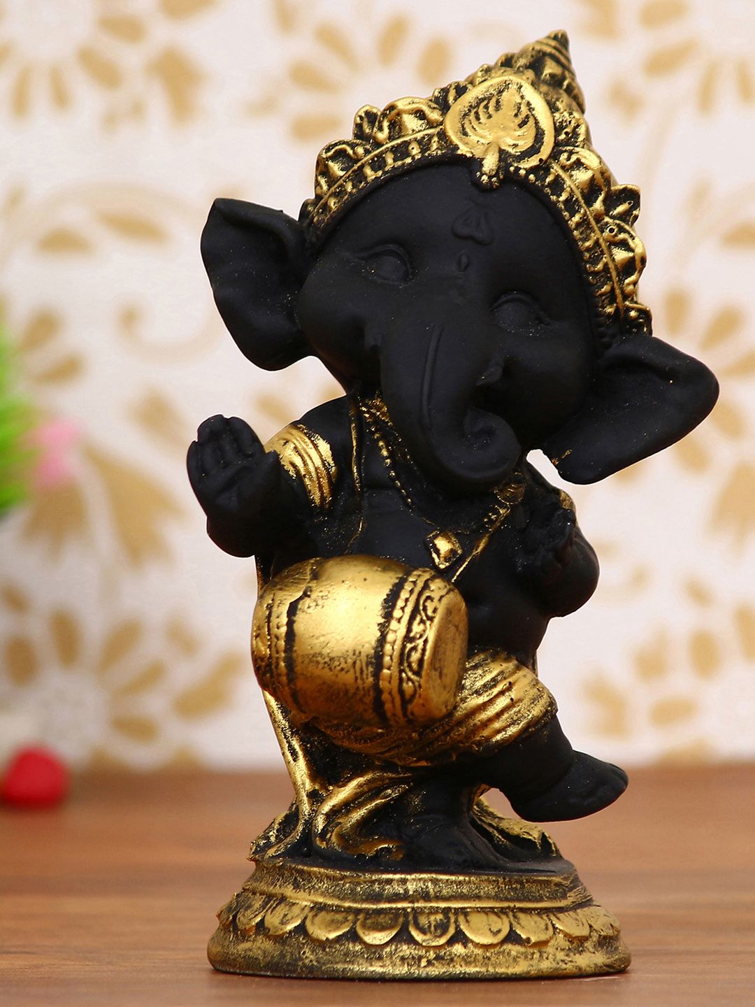 eCraftIndia Black & Gold-Toned Lord Ganesha Dancing Avatar Decorative Showpiece Price in India