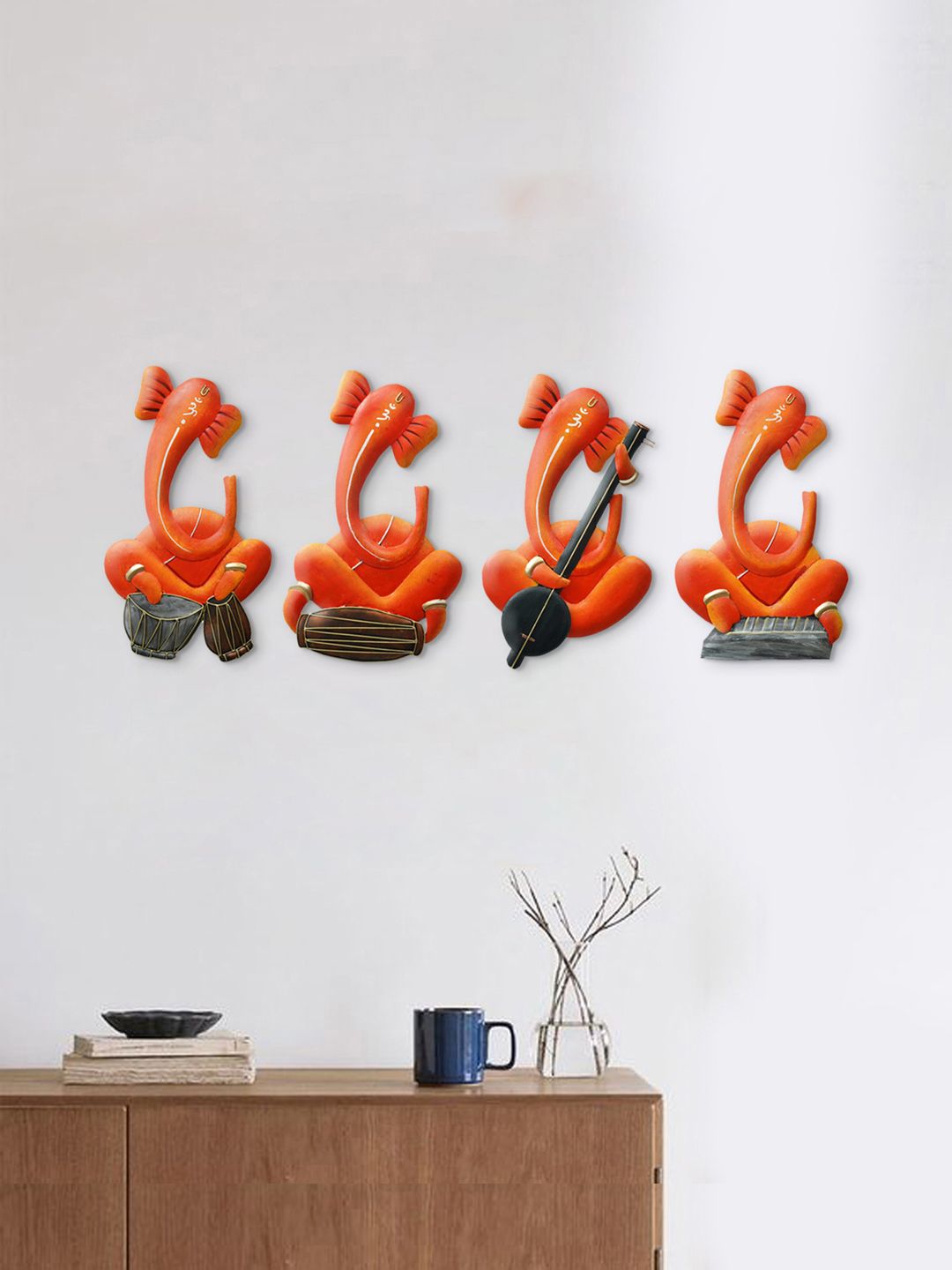 eCraftIndia Set of 4 Orange Coloured & Black Handcrafted Musician Lord Ganesha Wall Hanging Showpiece Price in India