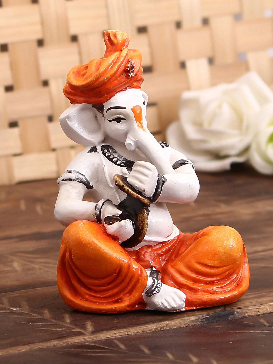 eCraftIndia White & Orange-Coloured Handcrafted Lord Ganesha Playing Manjira Decorative Showpiece Price in India