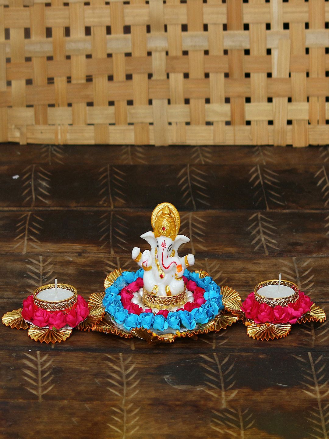eCraftIndia White & Blue Handcrafted Lord Ganesha Idol On Decorative Plate with Two Tealight Holders Showpiece Price in India