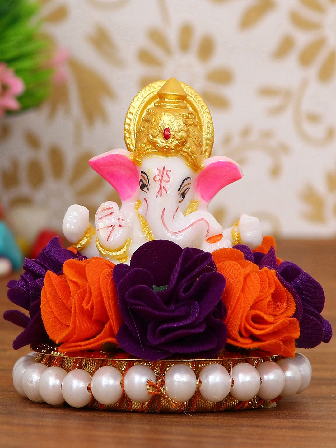 eCraftIndia Orange-Colored & White Handcrafted Lord Ganesha Idol On Decorative Plate With Flowers Showpiece Price in India