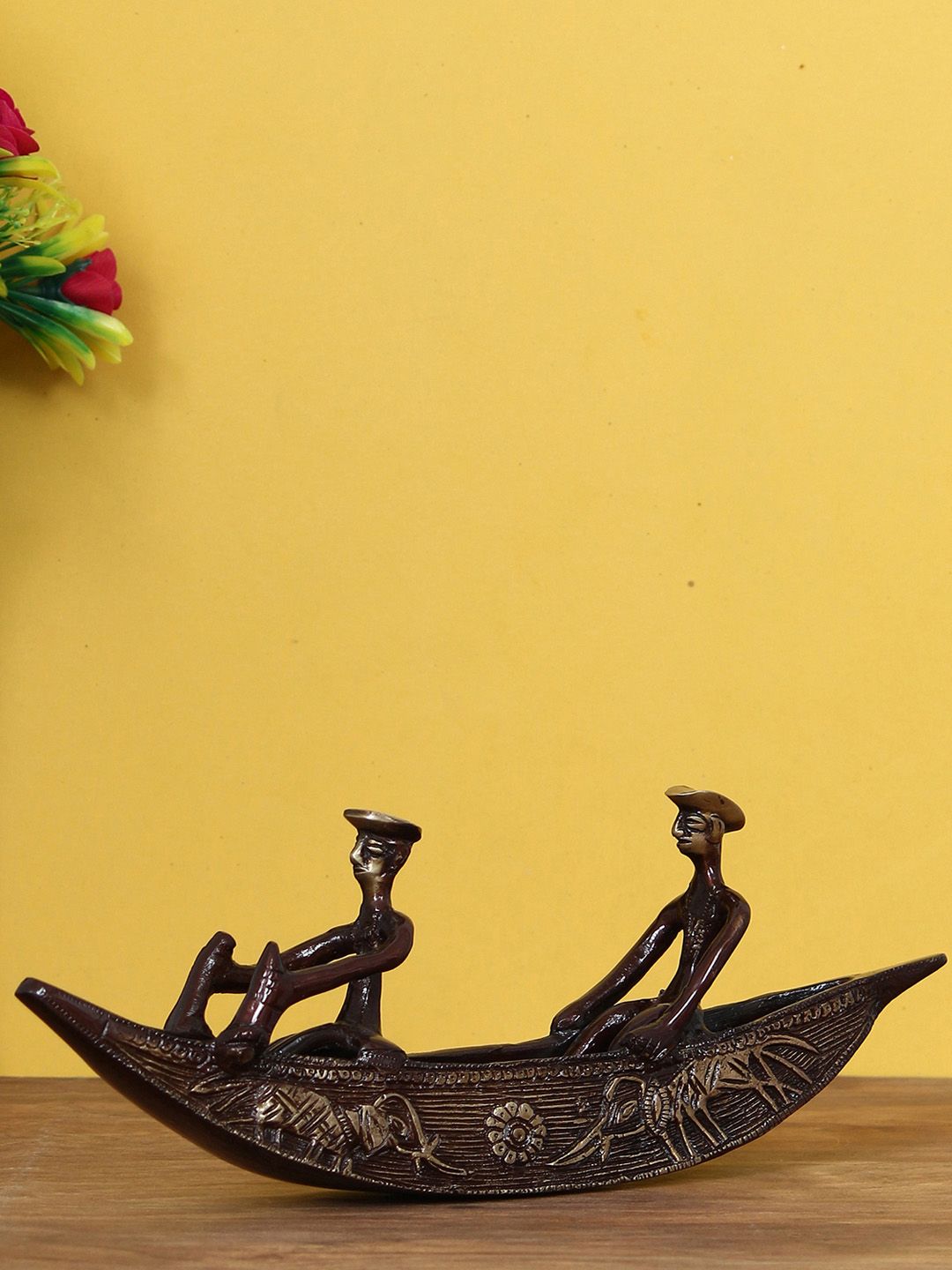 eCraftIndia Bronze-Toned Handcrafted Antique Finish 2 Men in Boat Decorative Showpiece Price in India