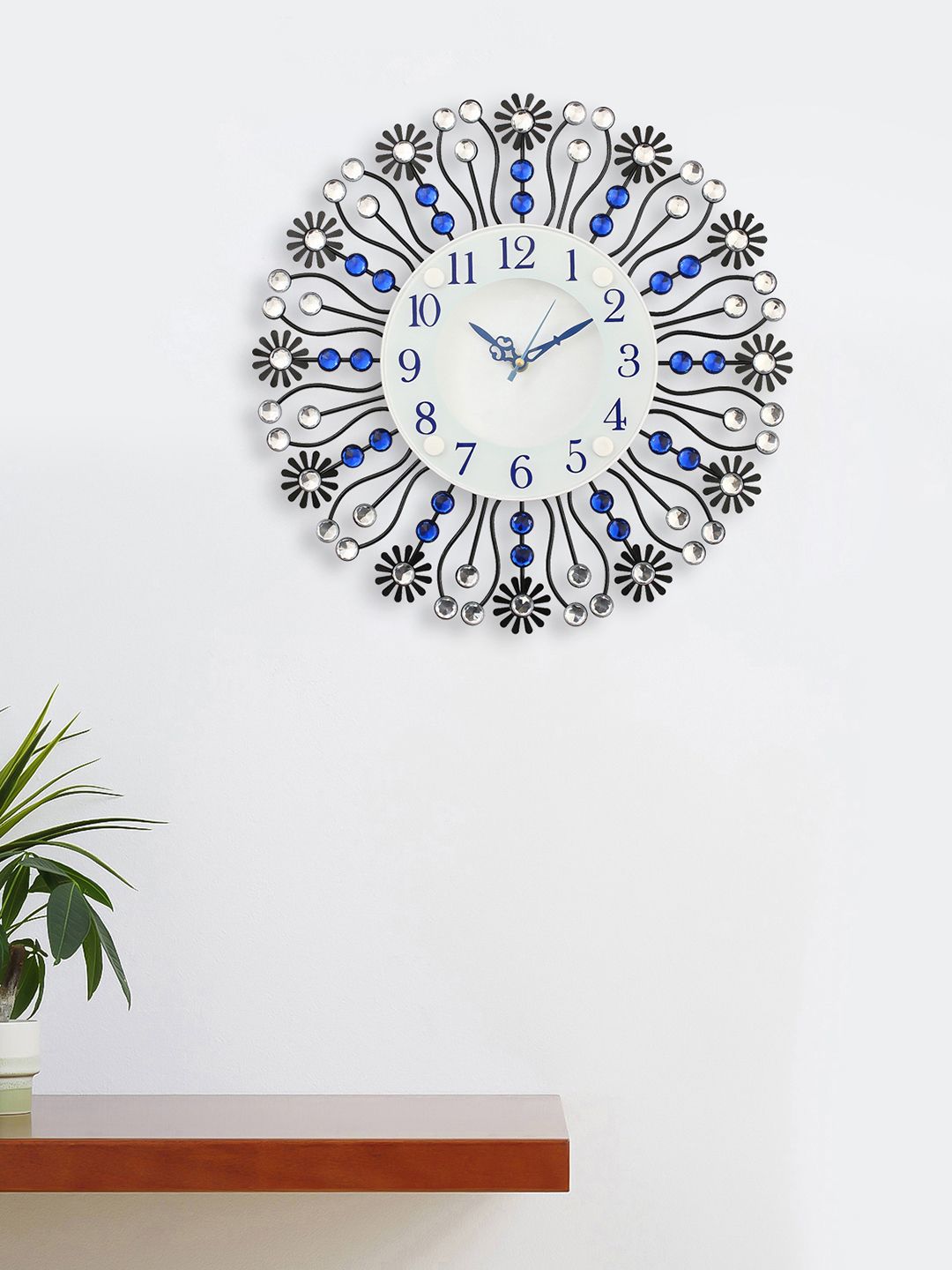 eCraftIndia White & Blue Handcrafted Round Embellished 37 cm Analogue Wall Clock Price in India