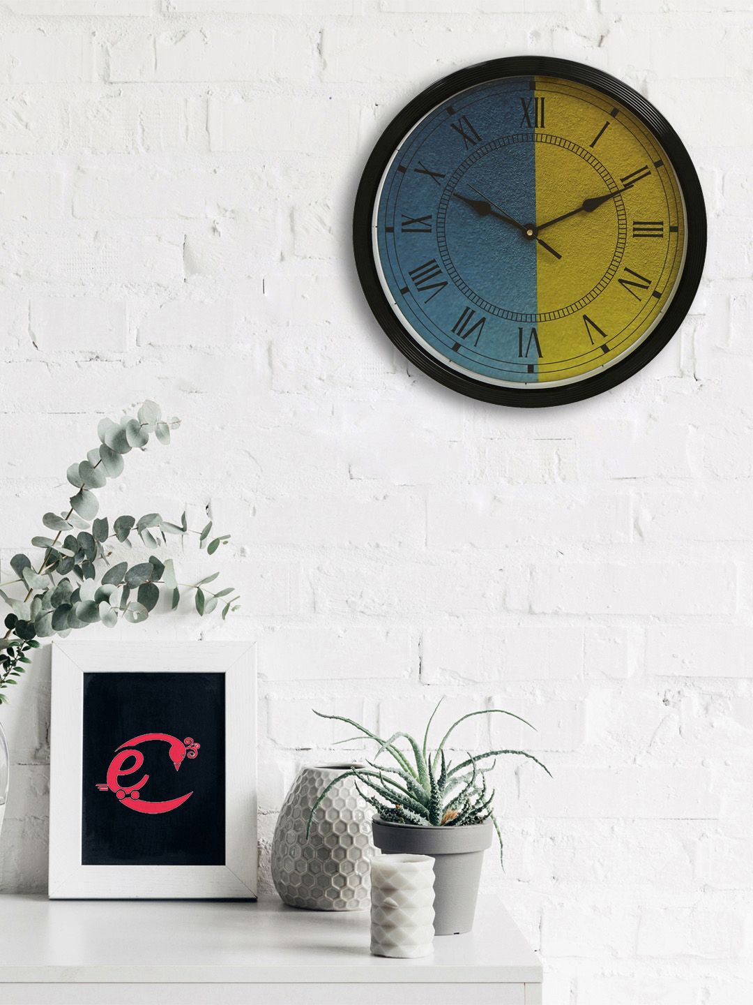 eCraftIndia Blue & Yellow Round Colourblocked Analogue Wall Clock Price in India