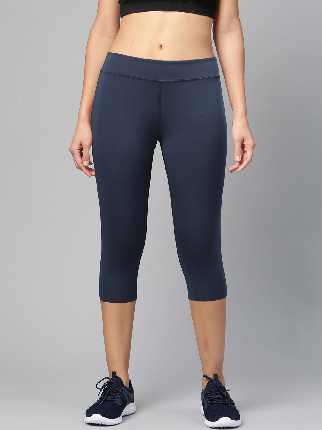 Reebok Women Navy Solid Workout Ready PP Capri Training Tights Price in India