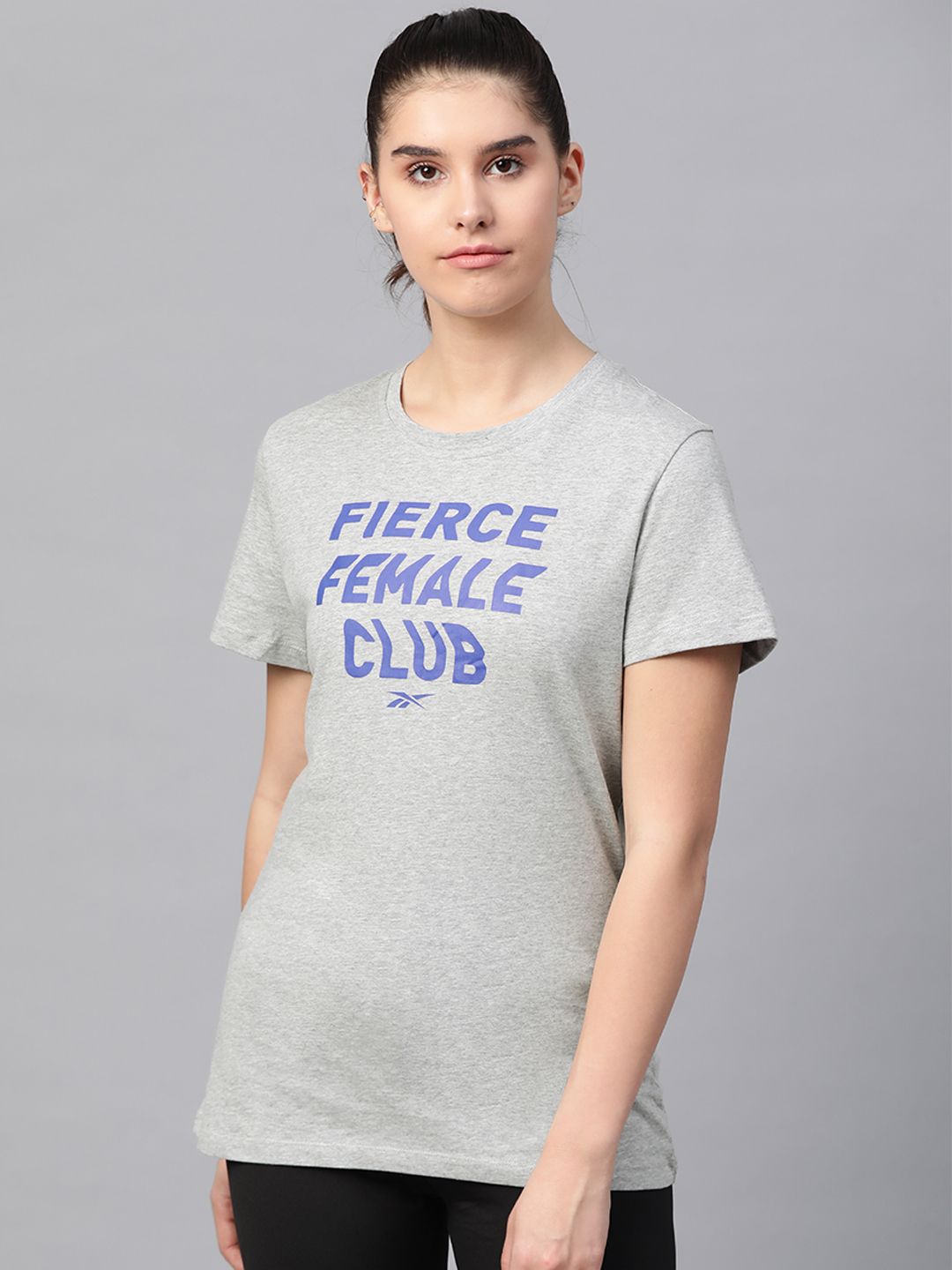 Reebok Women Grey Melange TE Graphic Fierce Pure Cotton Printed Training Pure Cotton T-shirt Price in India