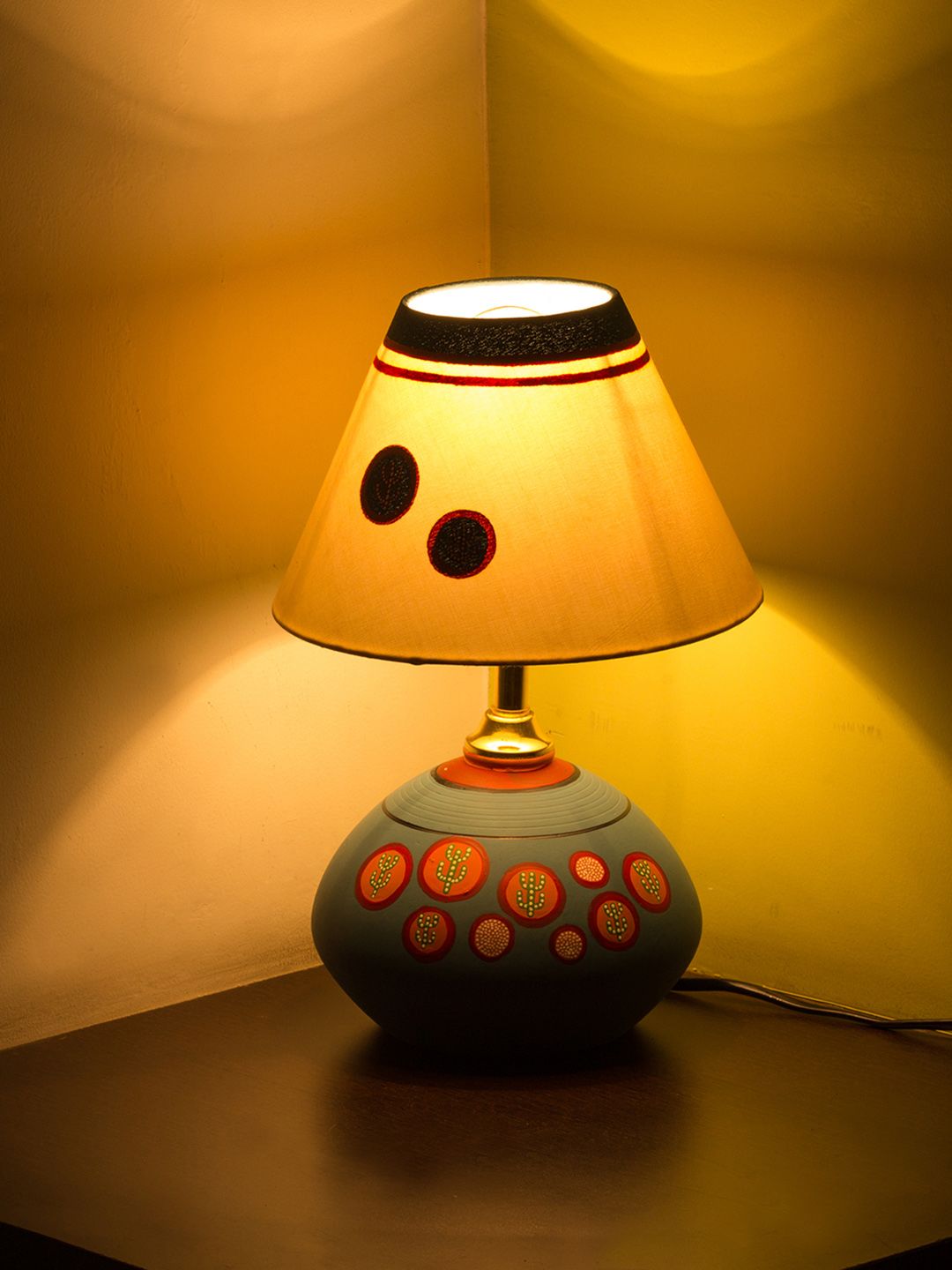 ExclusiveLane Teal Textured Hand-Painted Oasis in Light Matki Shaped Terracotta Table Lamp Price in India