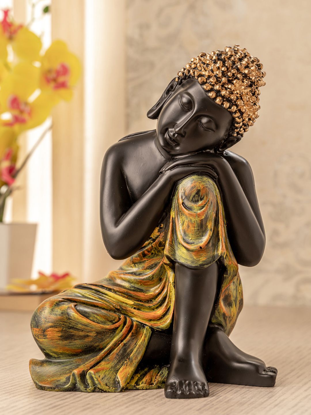TIED RIBBONS Gold-Toned & Black Lord Buddha Idol in Calm Posture Showpiece Price in India