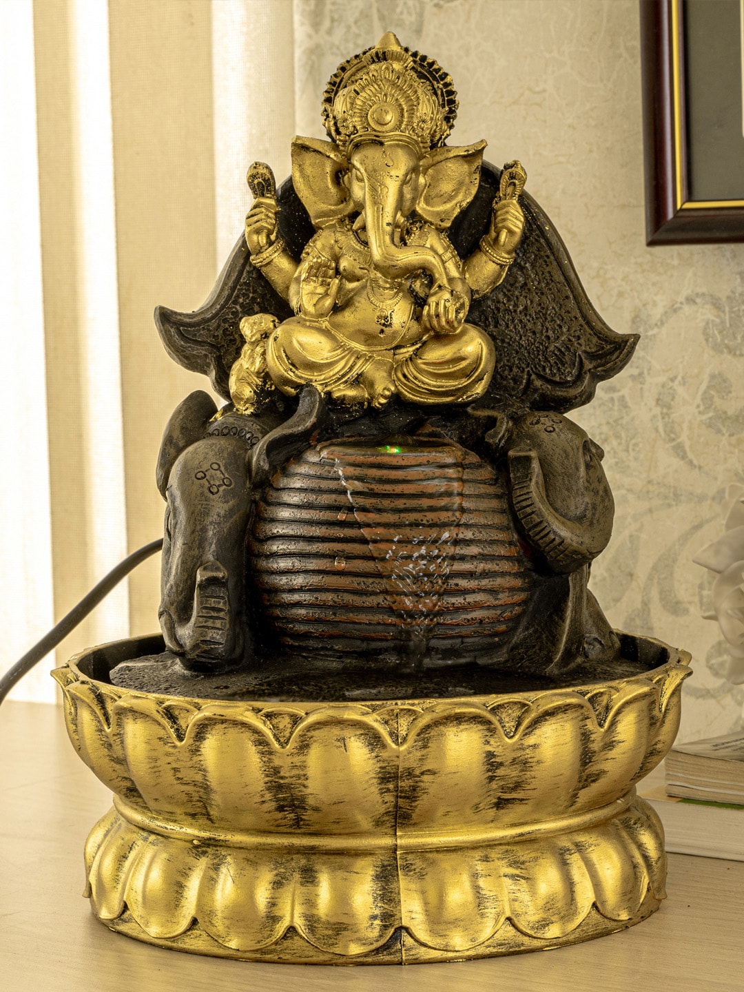 TIED RIBBONS Gold-Toned & Black Housewarming Ganesha Water Fountain Price in India