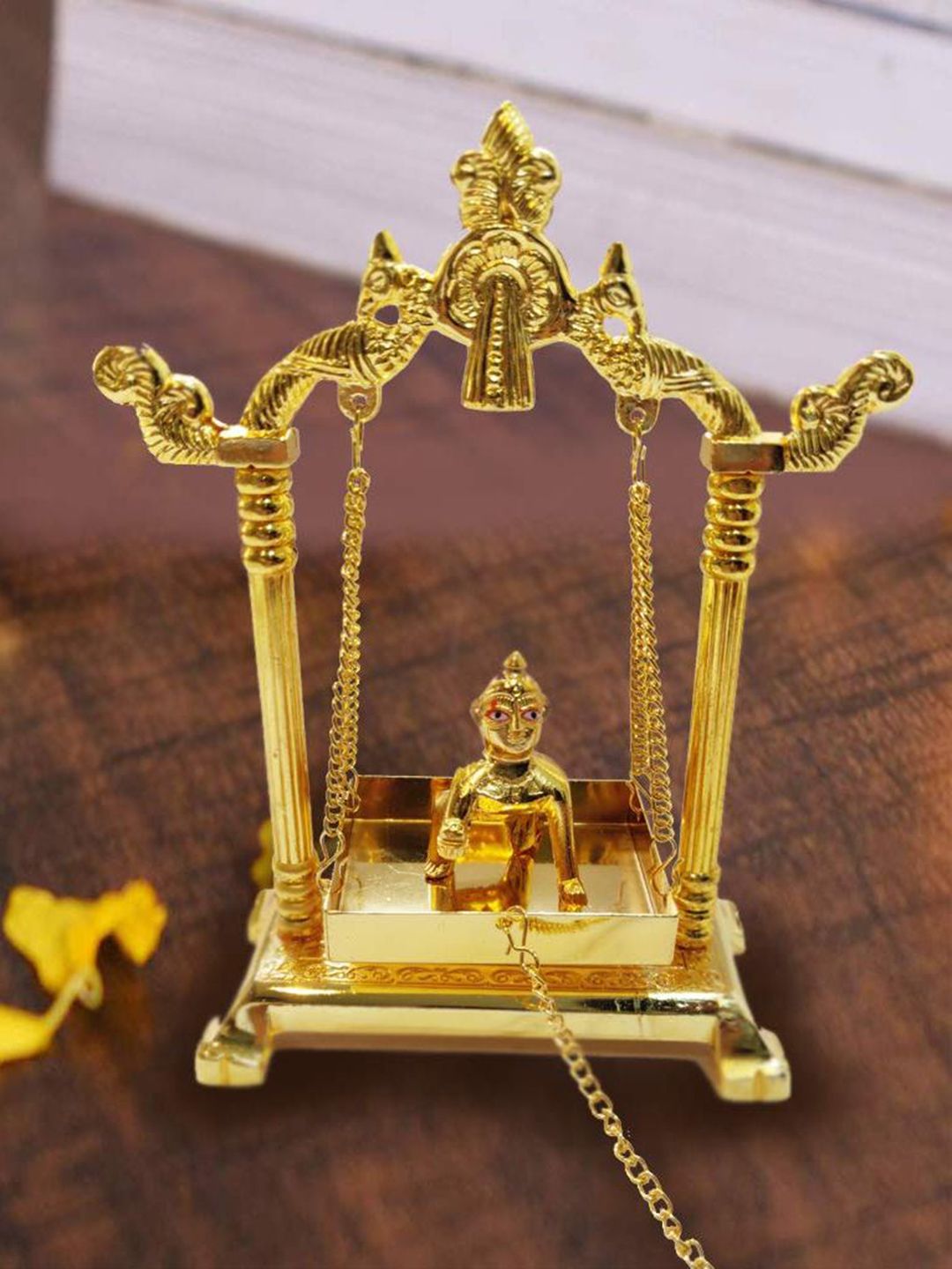 CraftVatika Gold-Plated Swing Jhula Ladoo Gopal Krishna Idol Showpiece Price in India