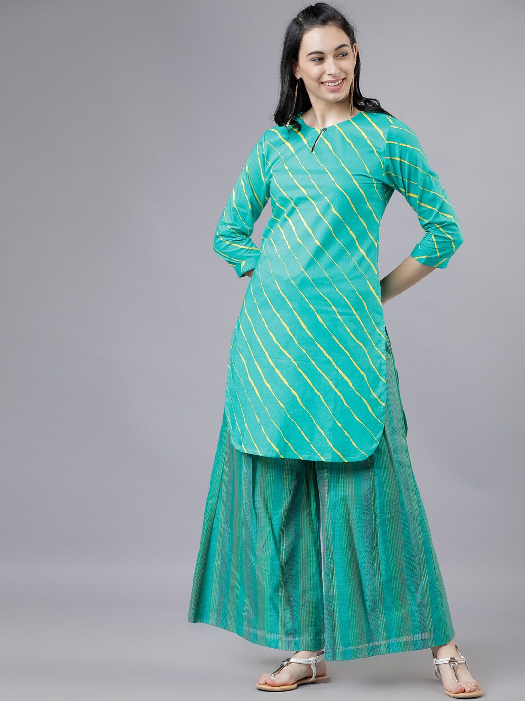 Vishudh Women's Turquoise Blue & Yellow Printed Tunic Price in India