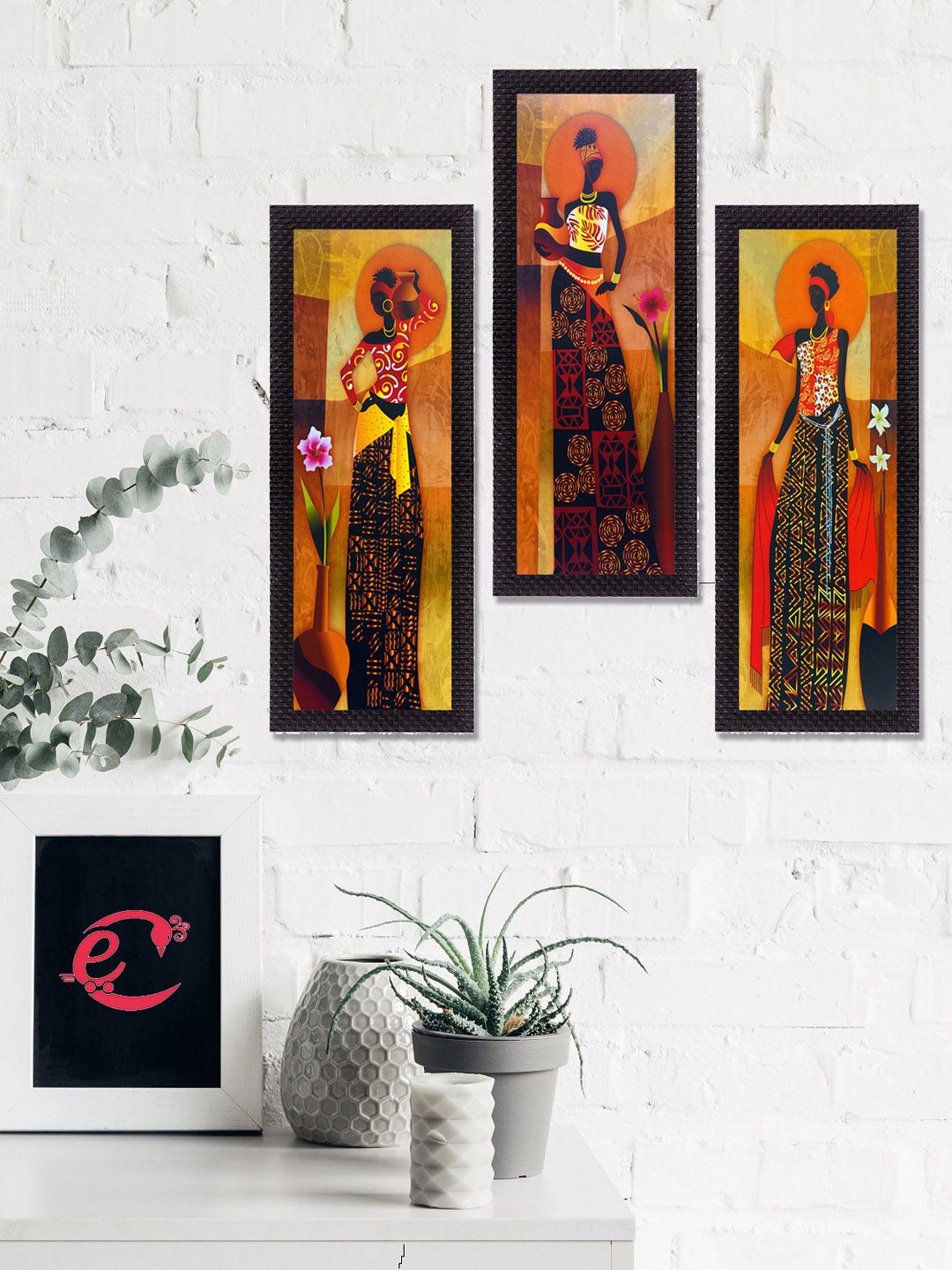 eCraftIndia Set Of 3 Orange & Black Tribal Lady Satin Matt Texture UV Wall Art Price in India