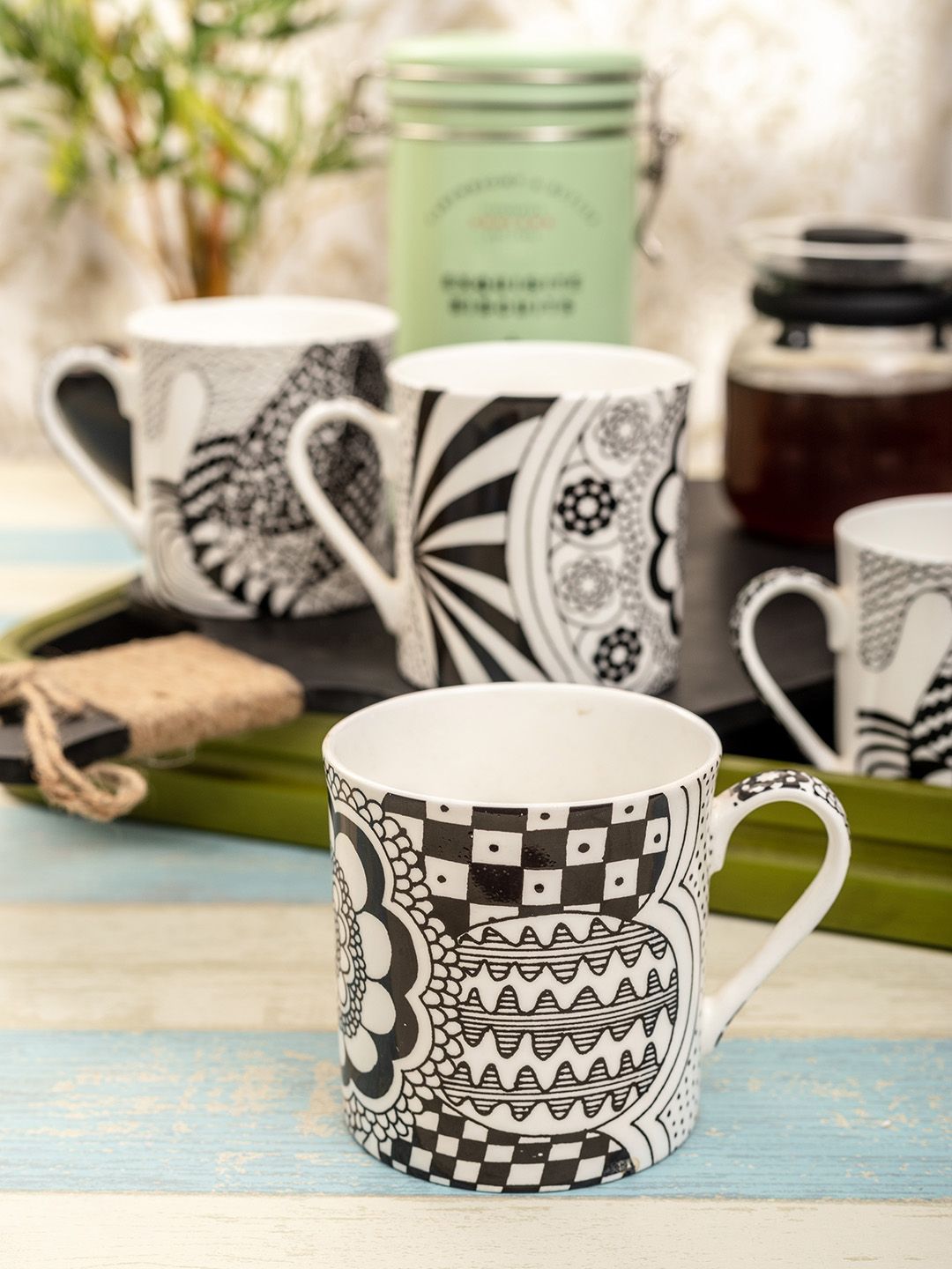 GOODHOMES Pack of 4 White & Black Printed Bone China Glossy Finish Mugs Set Price in India