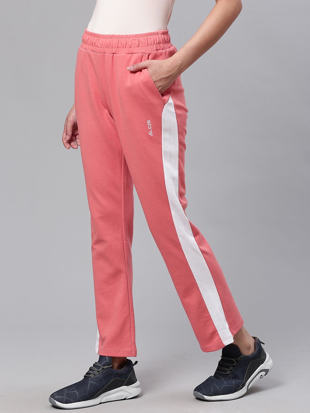 Alcis Women Coral Pink Slim Fit Solid Track Pants Price in India