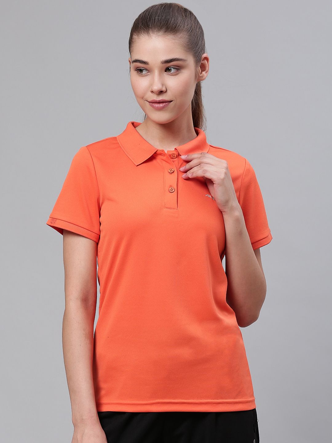 Alcis Women Orange Solid Polo Collar Sports T-shirt Price in India