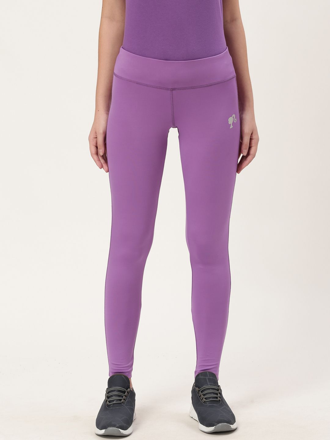 toothless Women Purple Solid Tights Price in India