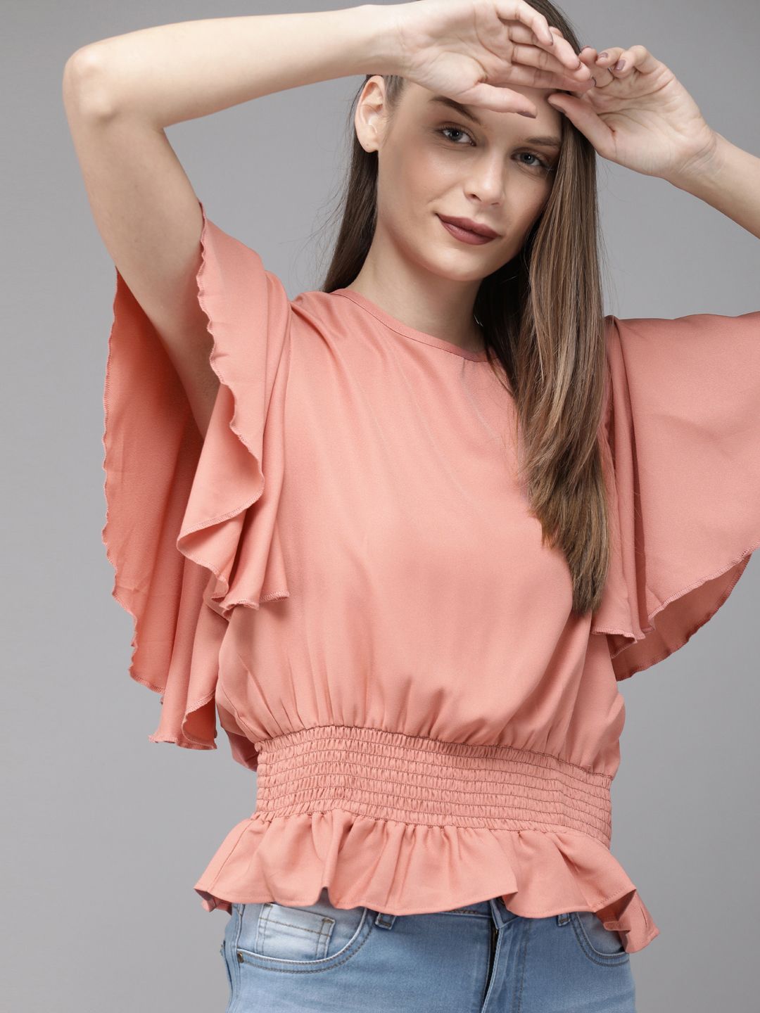 Roadster Women Peach-Coloured Solid Peplum Top