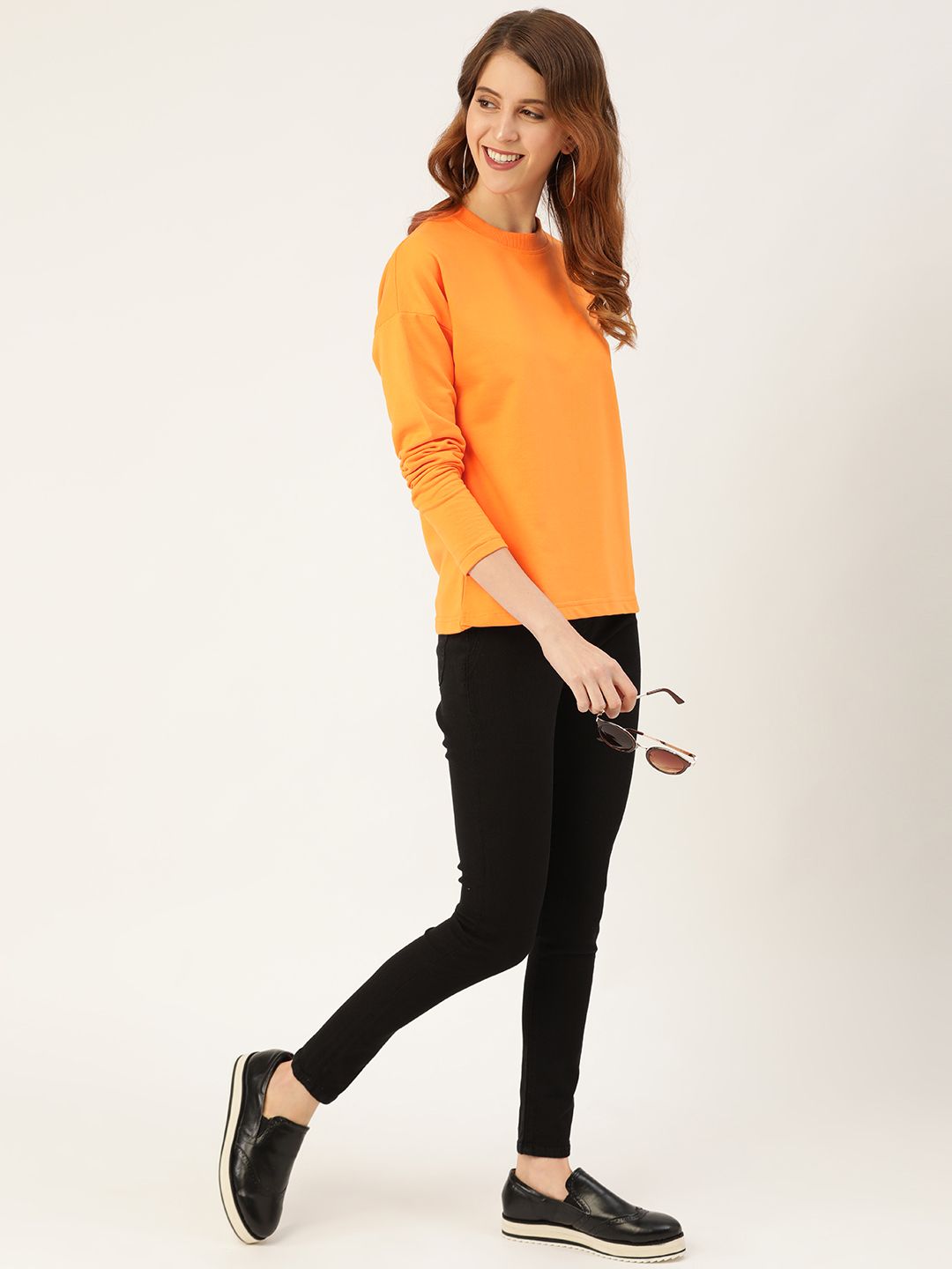 DressBerry Women Orange Solid Sweatshirt Price in India