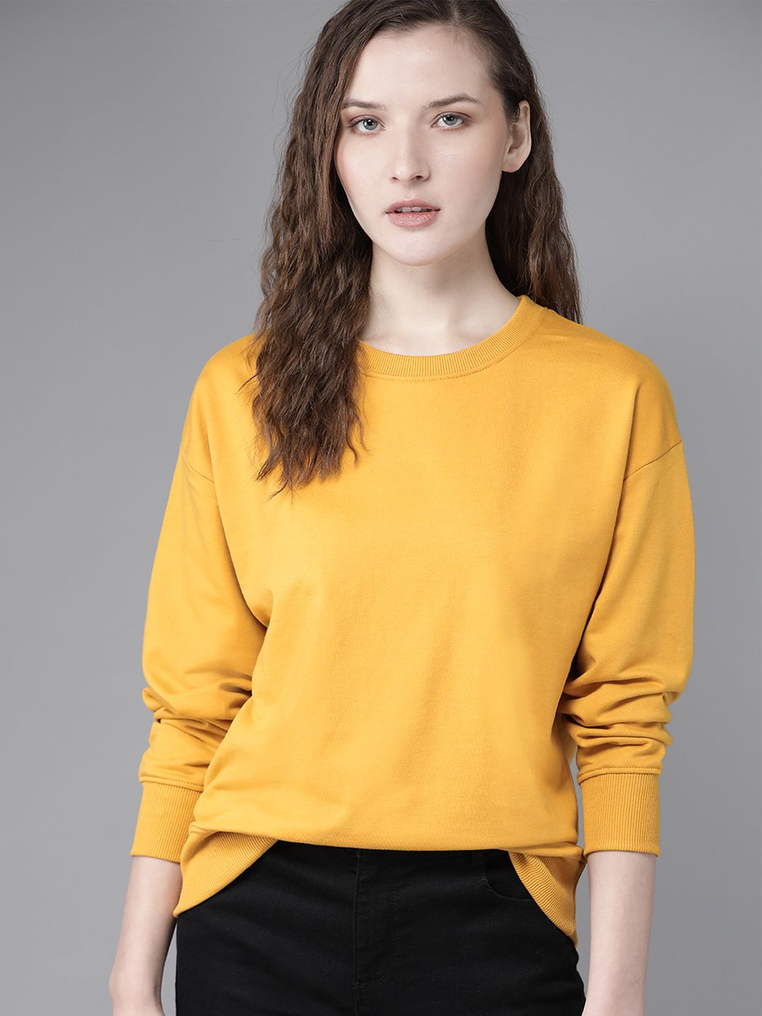 Roadster Women Mustard Yellow Boxy Solid Sweatshirt Price in India