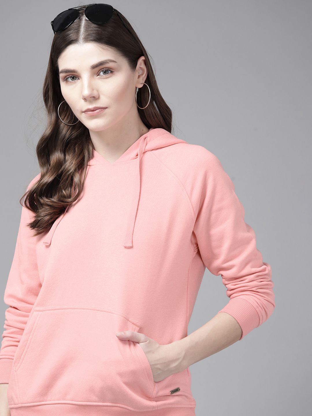Roadster Women Pink Solid Hooded Sweatshirt Price in India
