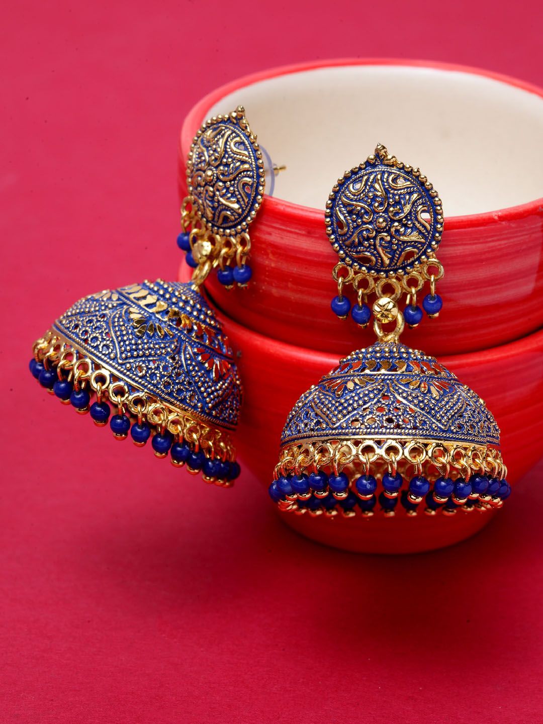 ANIKAS CREATION Blue Gold-Plated Enamelled Dome Shaped Jhumkas Price in India