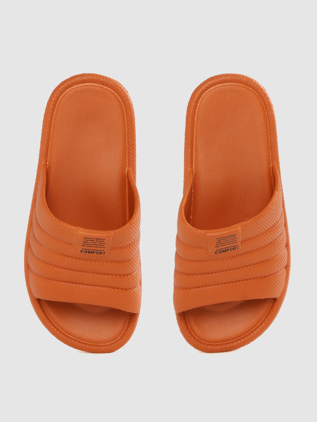 Kook N Keech Women Rust Orange Textured Sliders Price in India