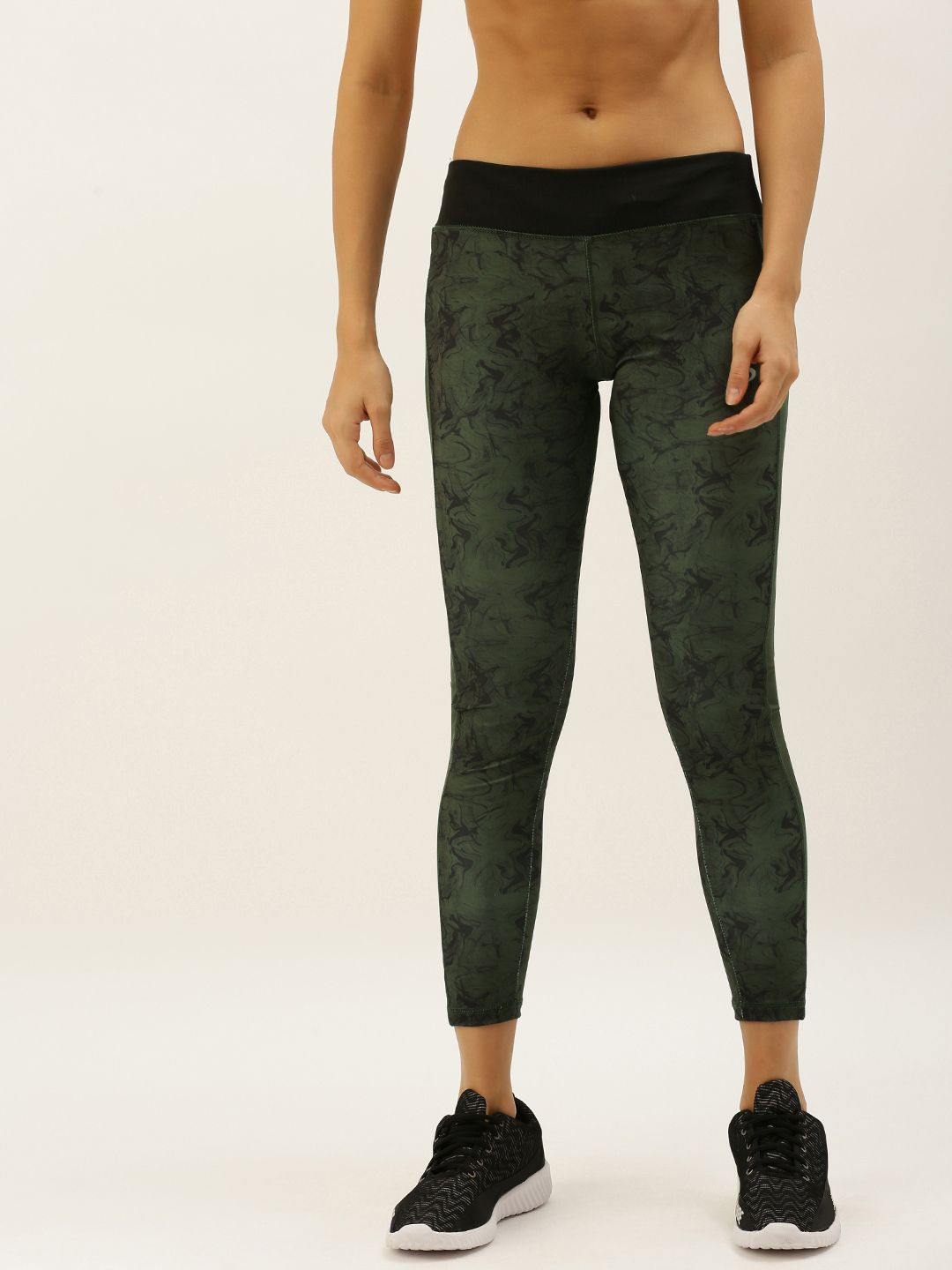 Proline Active Women Green & Black Printed Knitted Performance Fit Cropped Tights Price in India