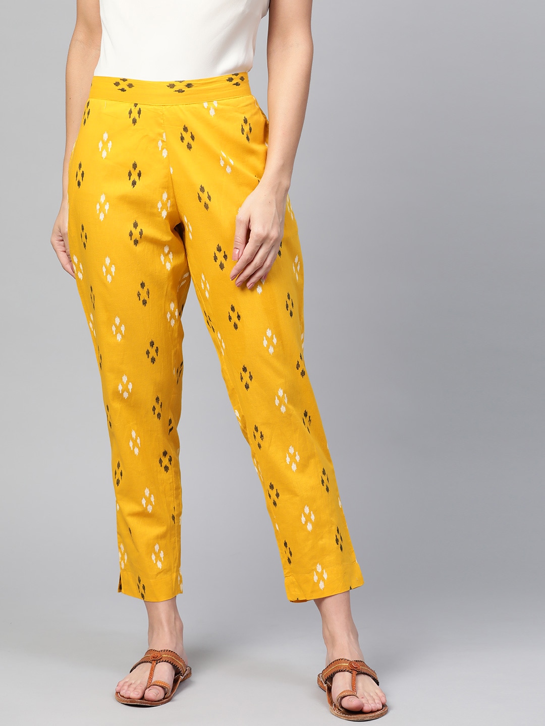 Sangria Women Mustard Yellow & Black Regular Fit Printed Cropped Regular Trousers Price in India