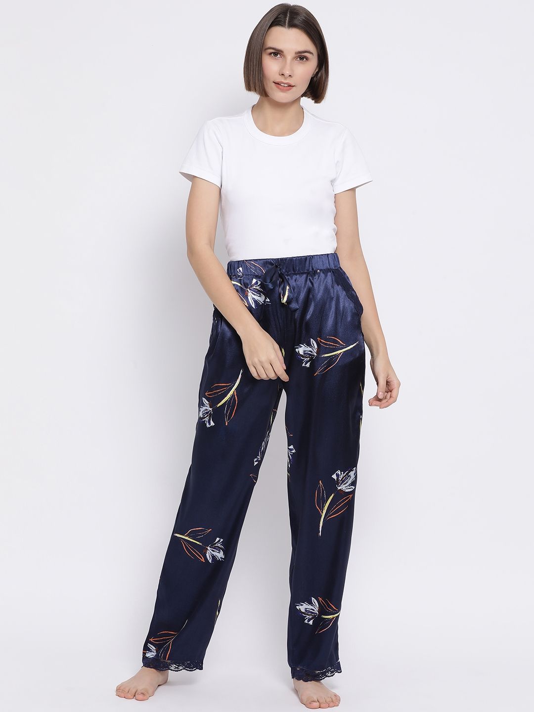 Oxolloxo Women Navy Blue Printed Feather Galactic Lounge Pants Price in India