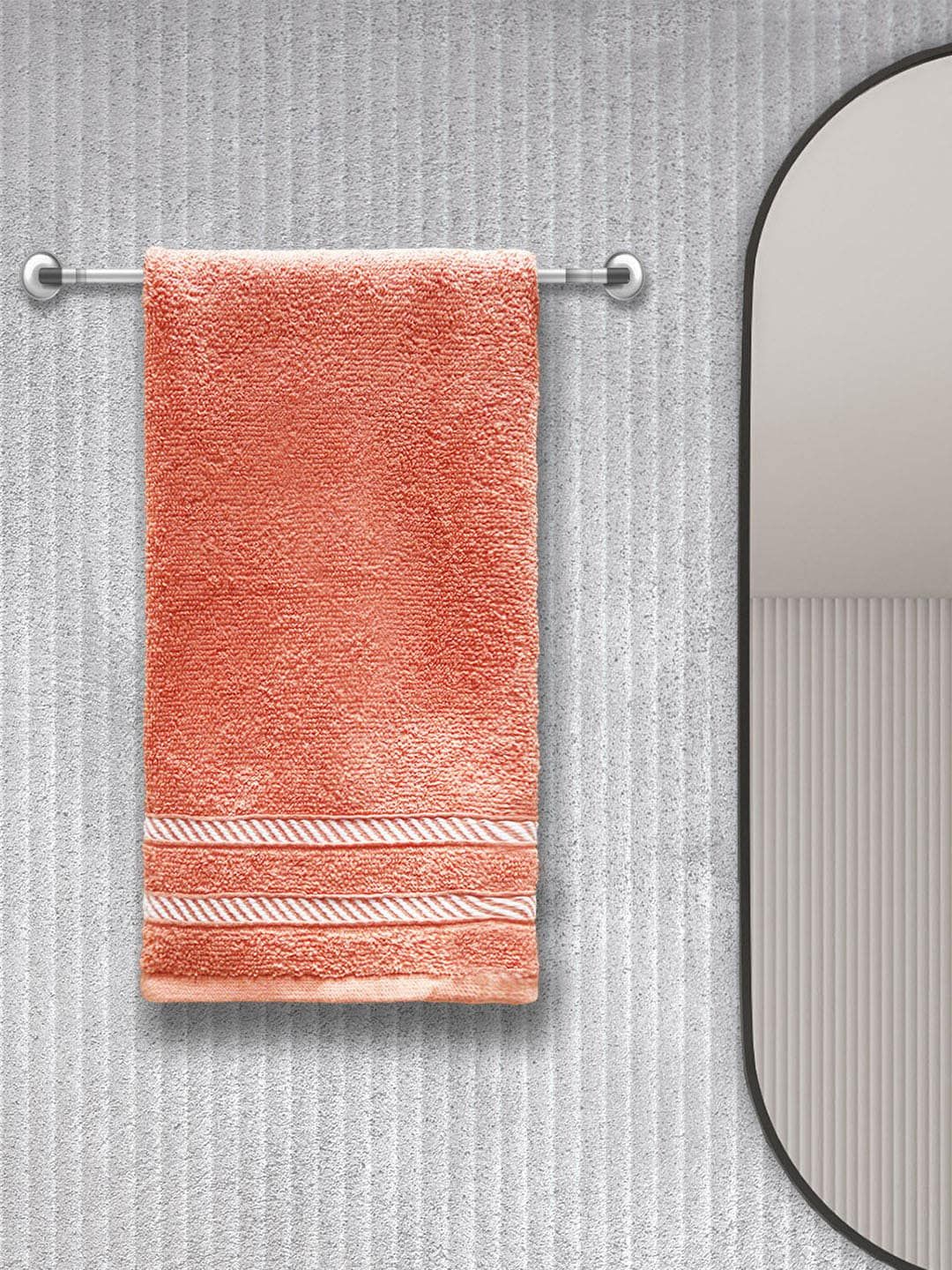 Trident Comfort Living Set Of 4 Peach-Coloured Solid 380 GSM Hand Towels Price in India