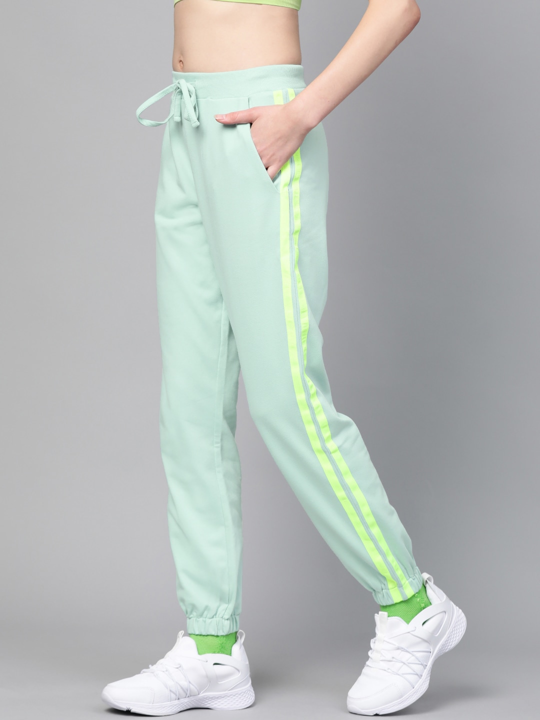 SASSAFRAS Women Sea Green Regular Fit Contrast Side Tape Solid Joggers Price in India