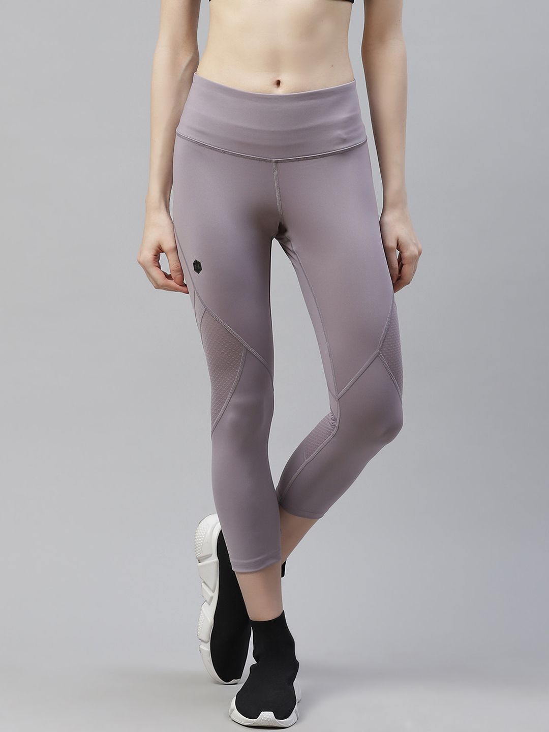 UNDER ARMOUR Women Lavender Solid Tights Price in India