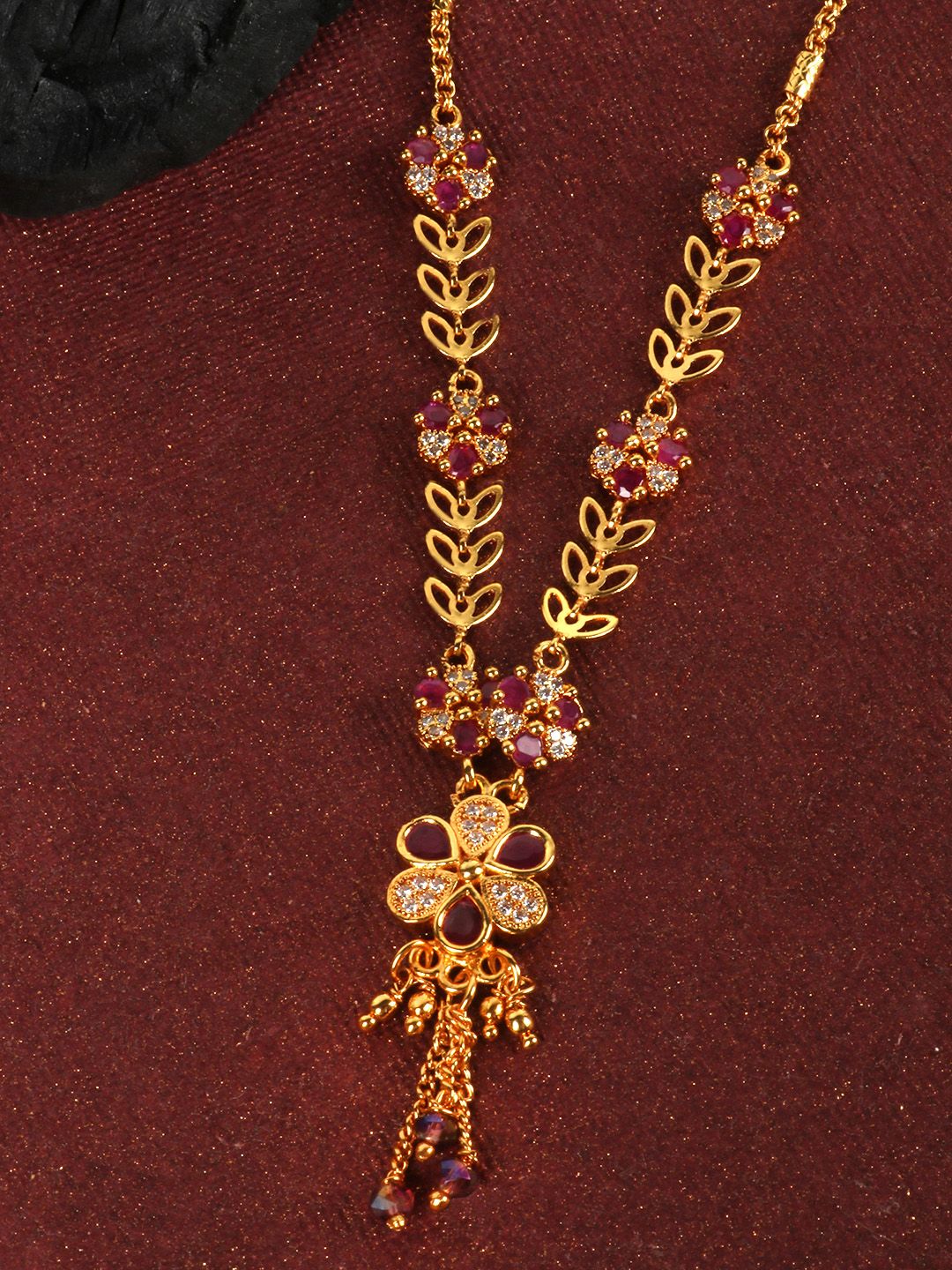 JEWELS GEHNA Magenta Gold-Plated AD-Studded & Beaded Handcrafted Floral Shaped Necklace Price in India