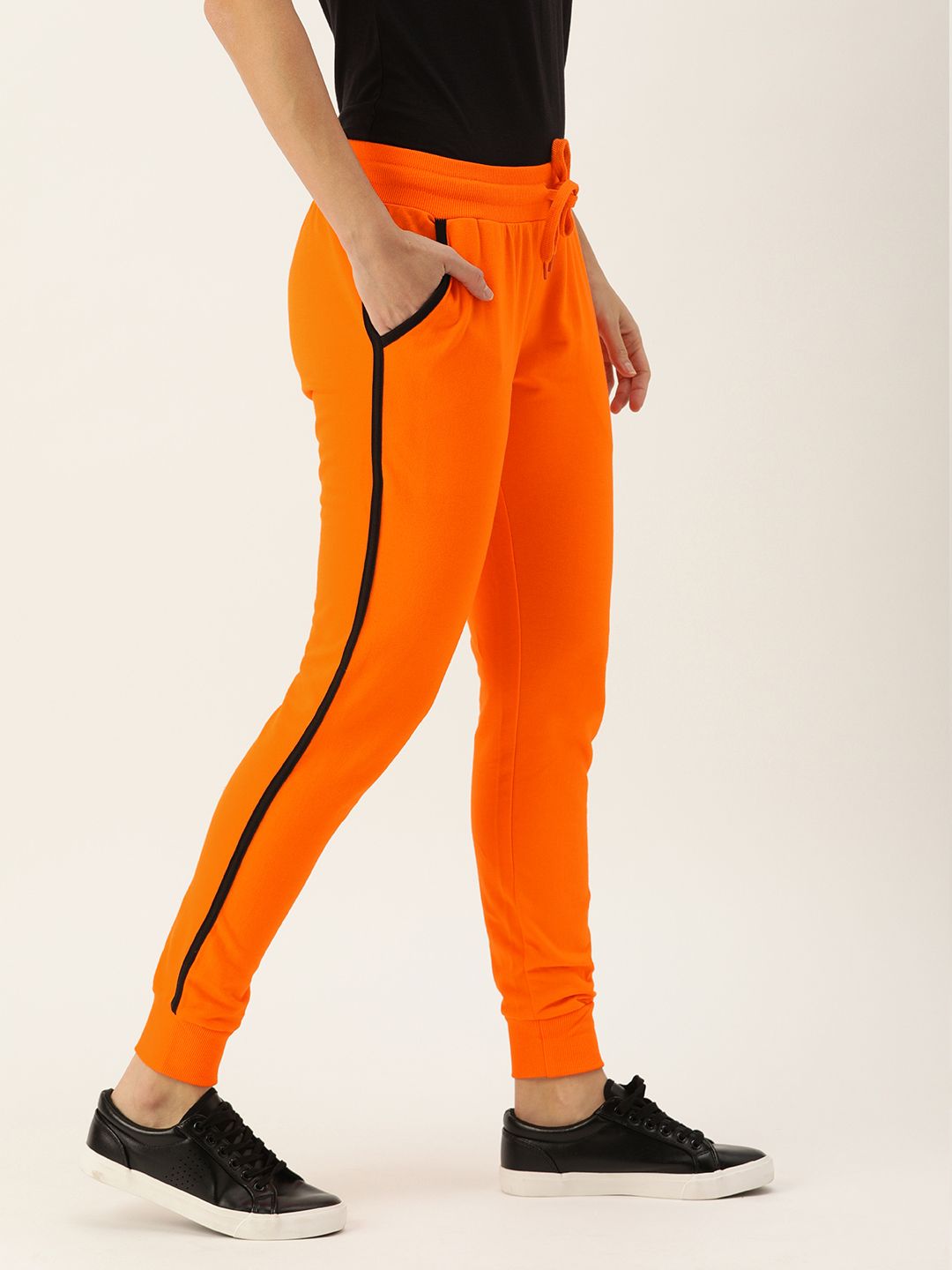 Genius18 Women Orange Solid Classic Fit Training Joggers Price in India