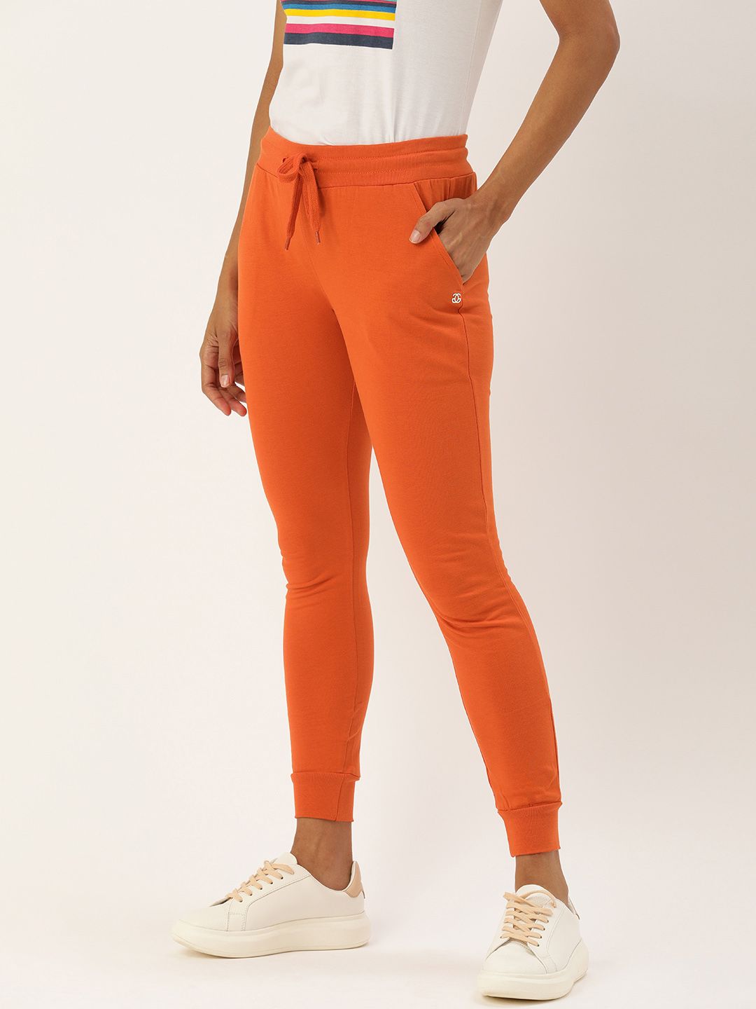 Genius18 Women Orange & Black Colourblocked Joggers Price in India