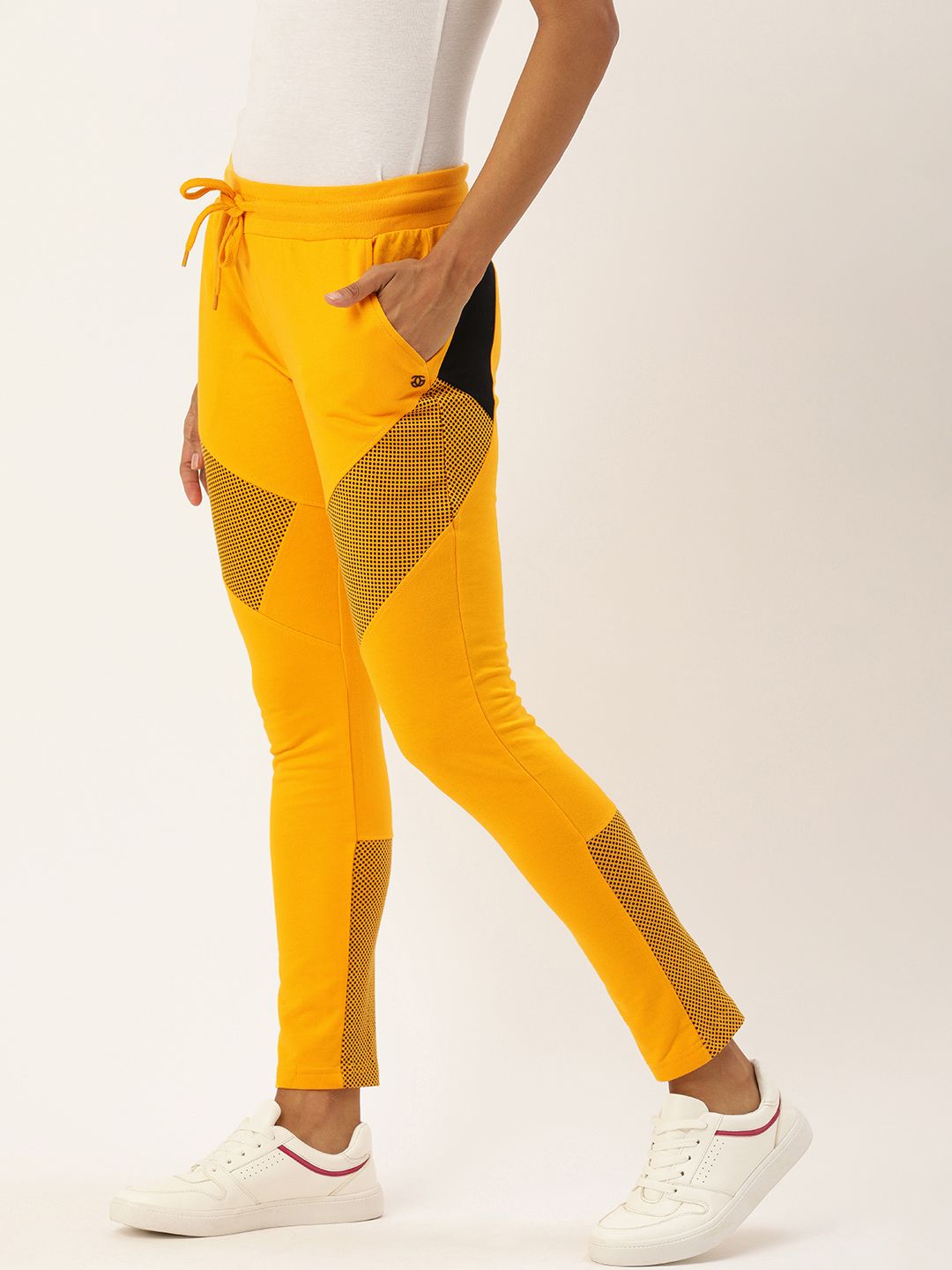 Genius18 Women Yellow Printed Slim Fit Track Pants Price in India