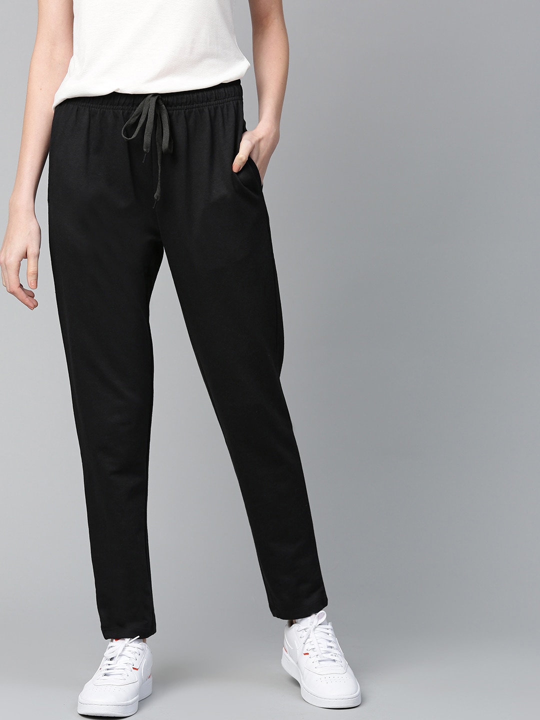 Mast & Harbour Women Black Solid Track Pants Price in India