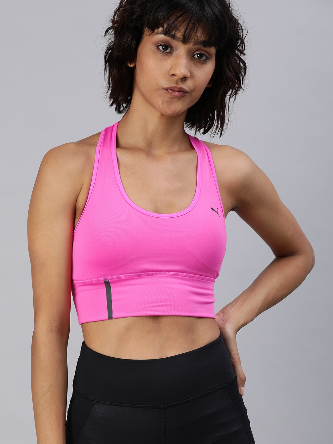 Puma Pink Solid Lightly Padded dryCELL Mid Impact Long Line Running & Training Bra Price in India