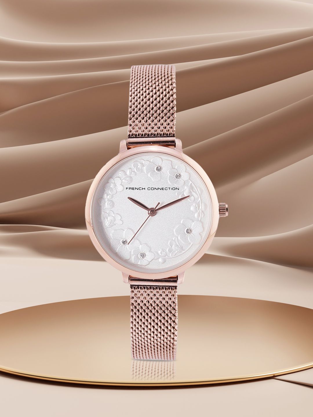 French Connection Women Muted Silver-Toned Floral Textured Analogue Watch FCL0006D Price in India