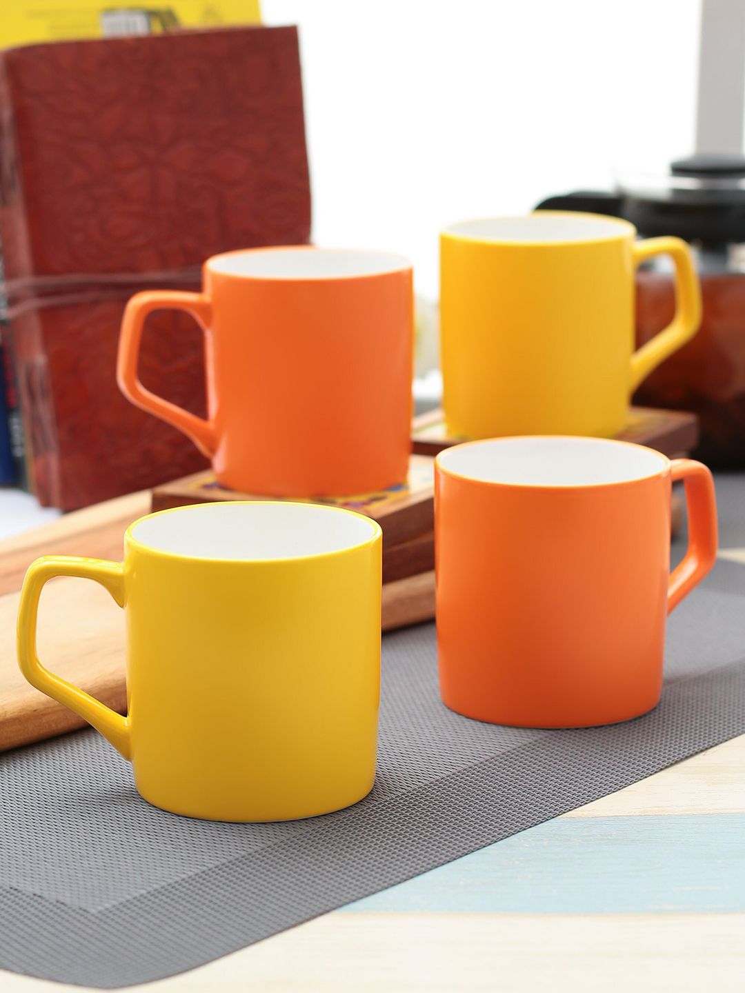 CLAY CRAFT Orange & Yellow Set of 4 Ceramic Mugs Price in India