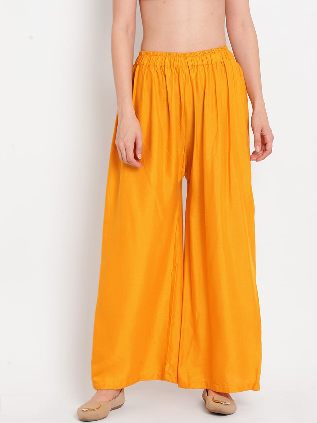 TAG 7 Women Mustard Yellow Solid Flared Palazzos Price in India